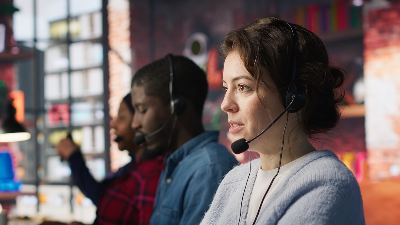 Call center professional supporting customers with a headset